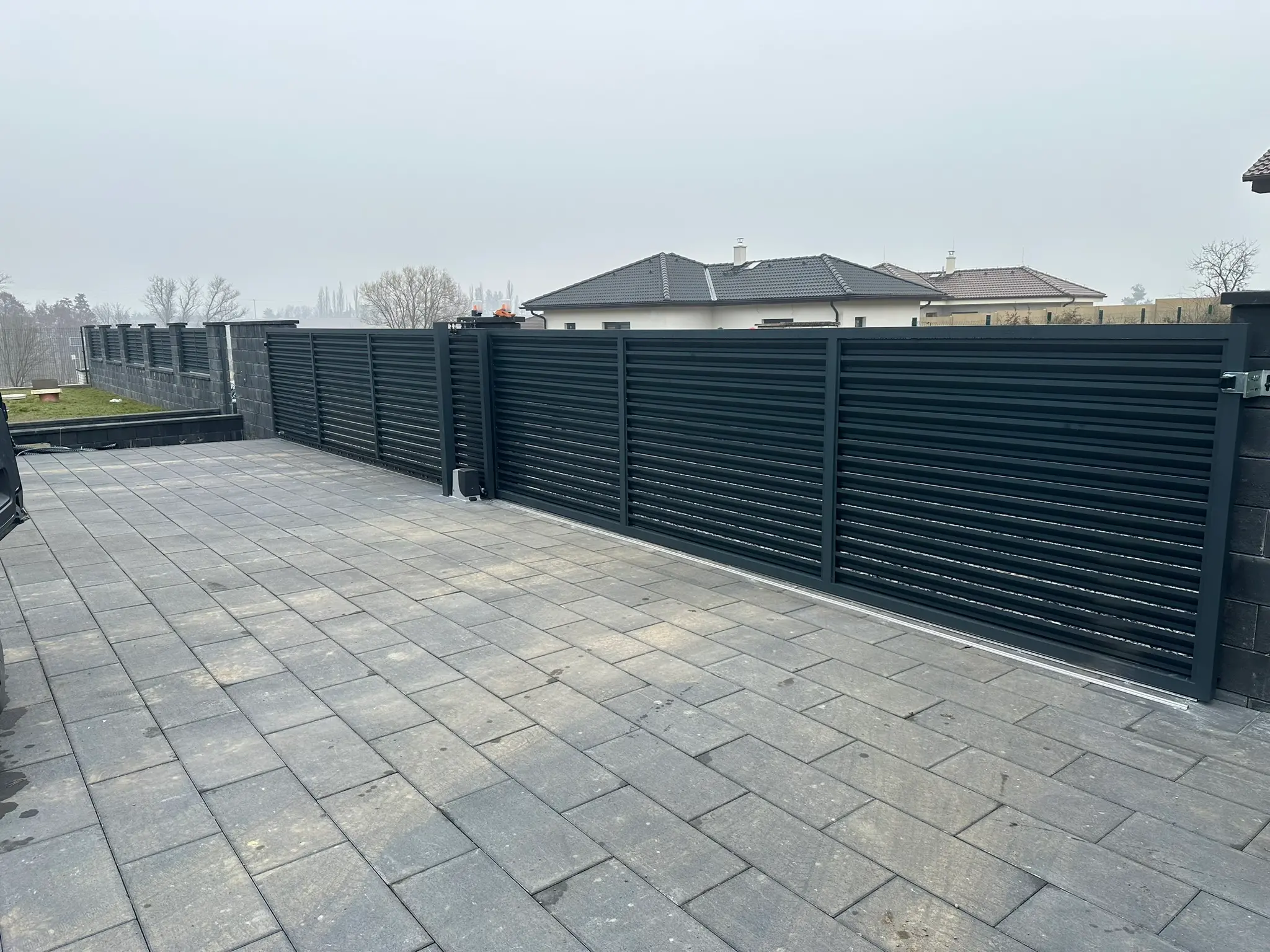 Cena za oplocení domu